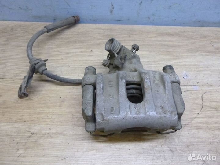 Суппорт задний левый,правый Mazda 3 (BK) 2002-2009