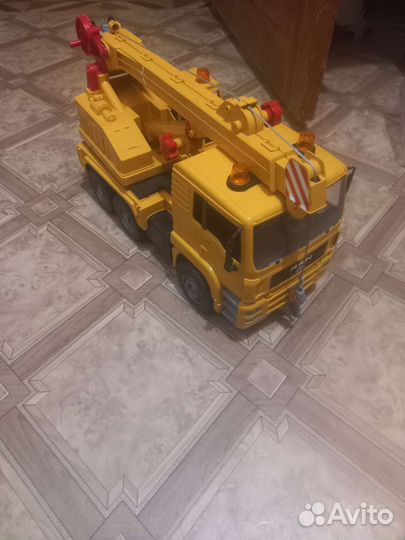 Игрушка MAN кран bruder