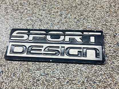 Эмблема Lexus Sport Design