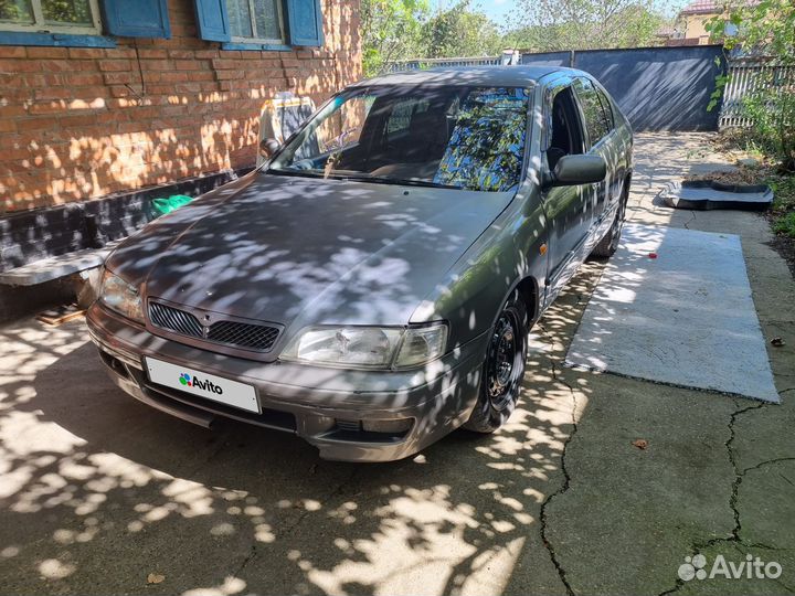 Nissan Primera 1.6 МТ, 1998, 323 923 км