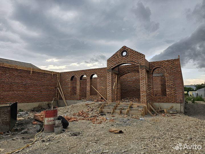 Каменщик строитель