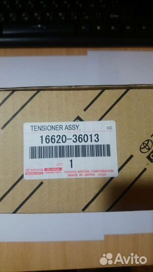 Натяжитель ремня в сборе с роликом