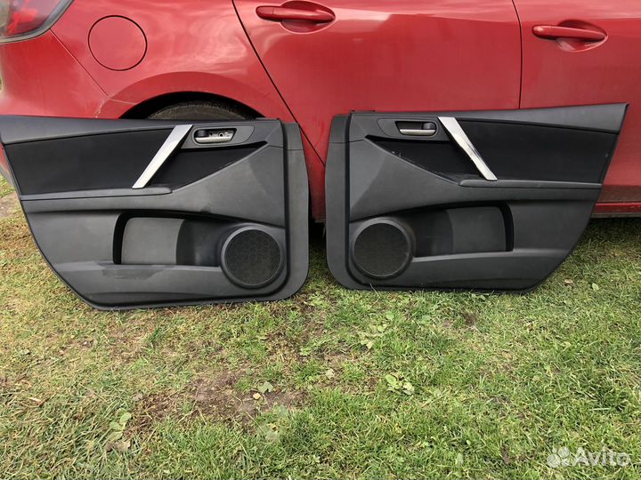 Обшивки двери Mazda 3 BL