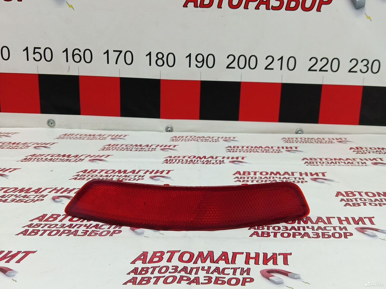 Катафот заднего бампера левый Джили Атлас