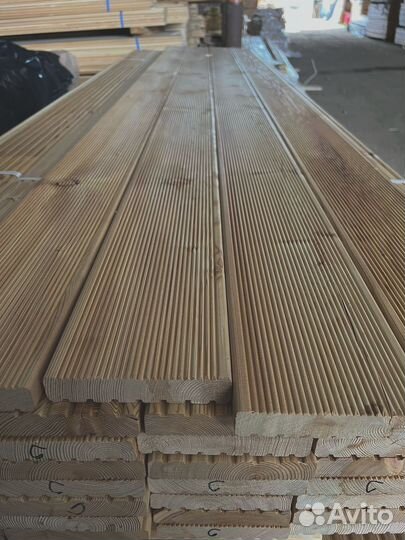 Доски лиственницы 55x130 мм, прошедшие камерную сушку