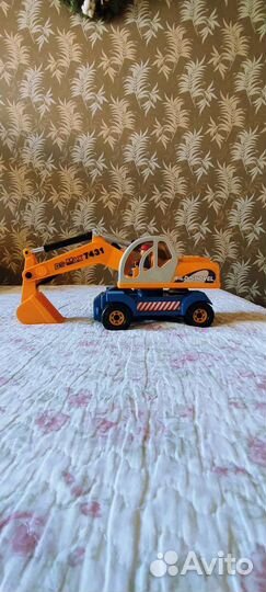 Игрушка экскаватор