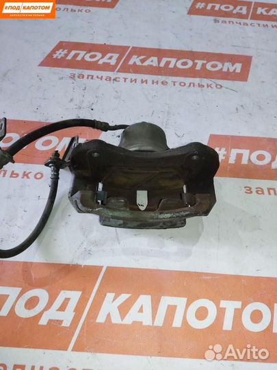 Суппорт тормозной передний левый Hyundai ix35 2012
