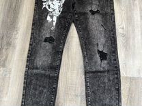Рваные джинсы amiri