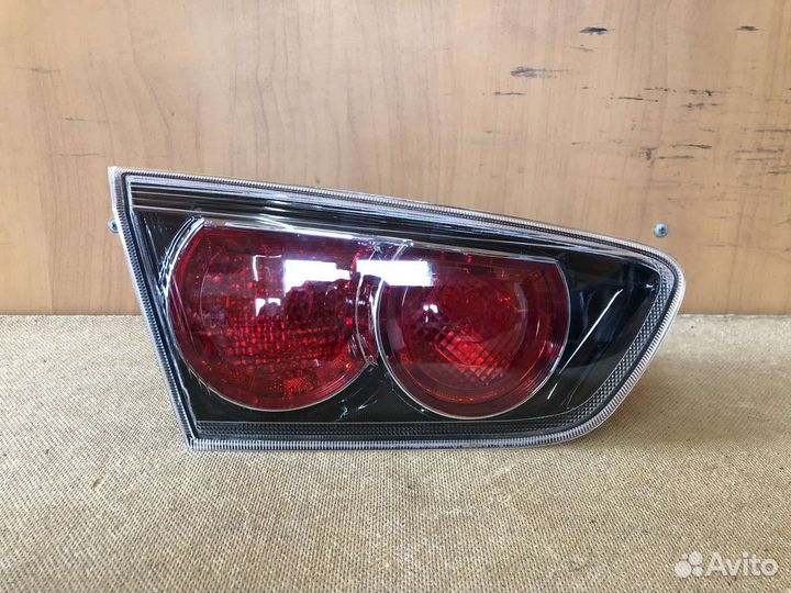 Фонарь в крышку багажника Mitsubishi lancer X