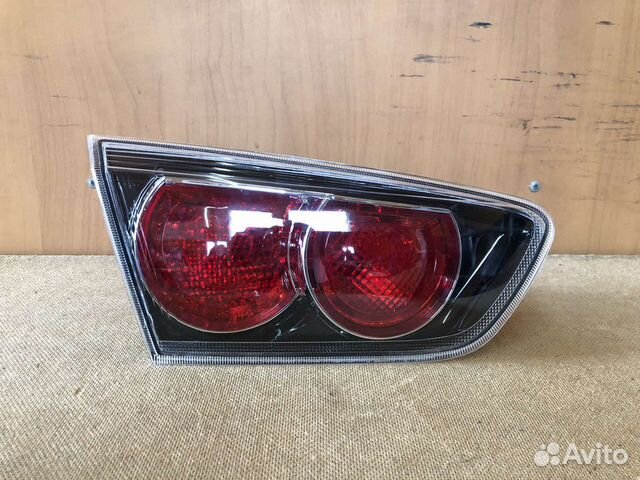 Фонарь в крышку багажника Mitsubishi lancer X