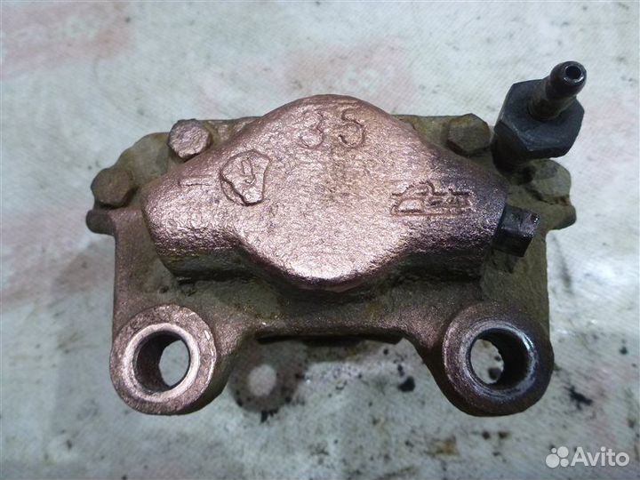 Суппорт задний левый Opel Omega F35 C20NE