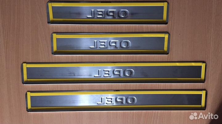 Накладки на пороги Opel Astra H (нержавейка)