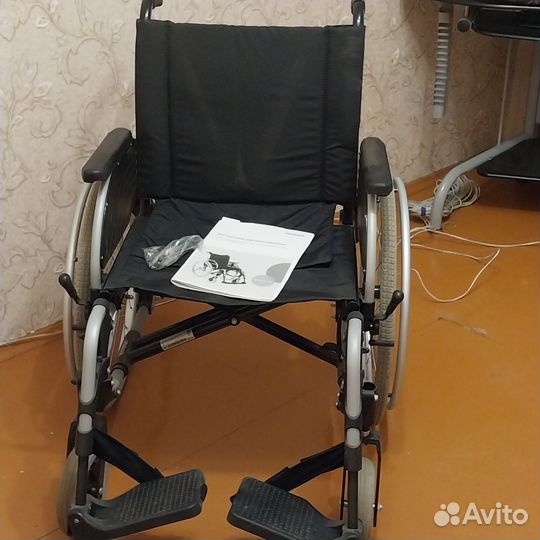 Инвалидной коляска