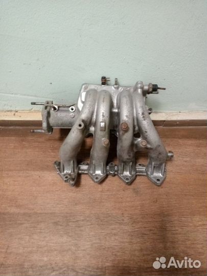 Коллектор впускной Toyota Carina E лифтбэк (T191)