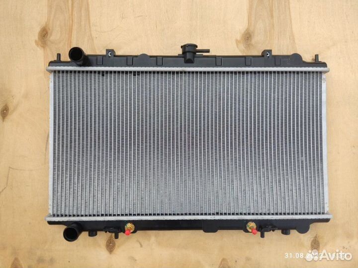Радиатор охлаждения двигателя Nissan Bluebird U14