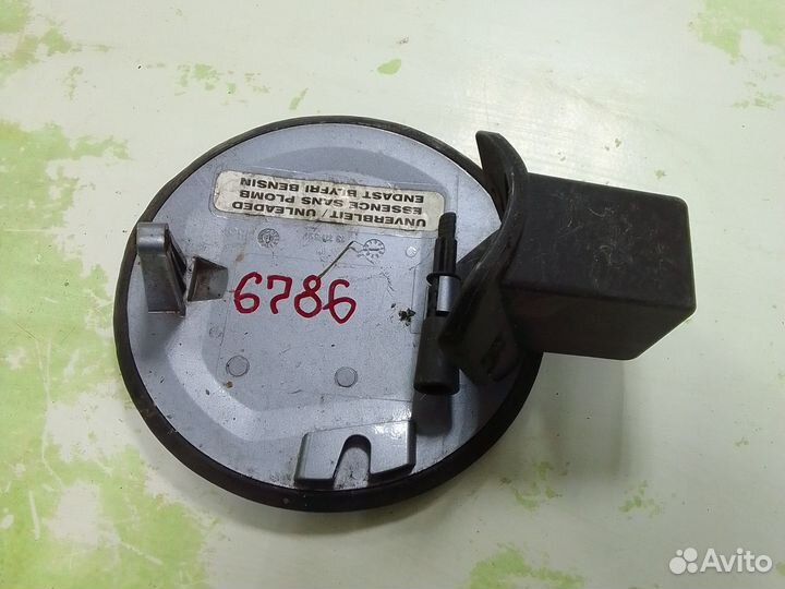 Лючок бензобака Opel Astra H