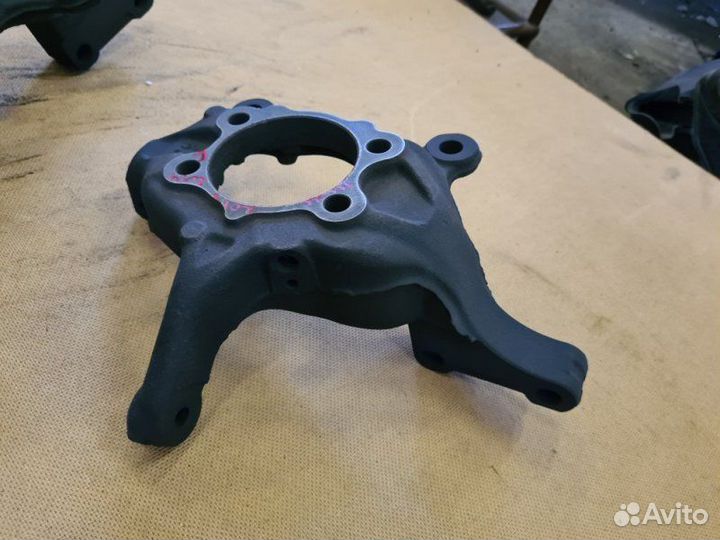 Кулак поворотный передний Nissan Juke F15 HR16DE