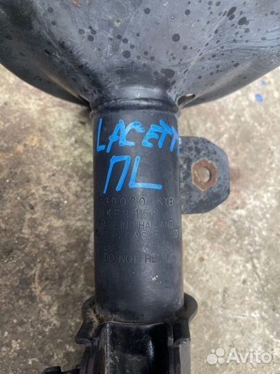 Стойка амортизатора передняя левая Chevrolet