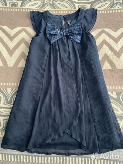 Одежда для девочки пакетом 128-134