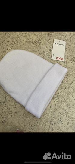 Шапки много