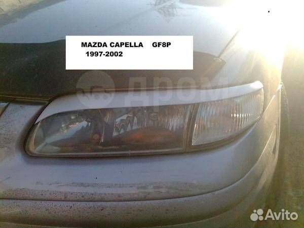 Реснички на фары mazda capella 1998