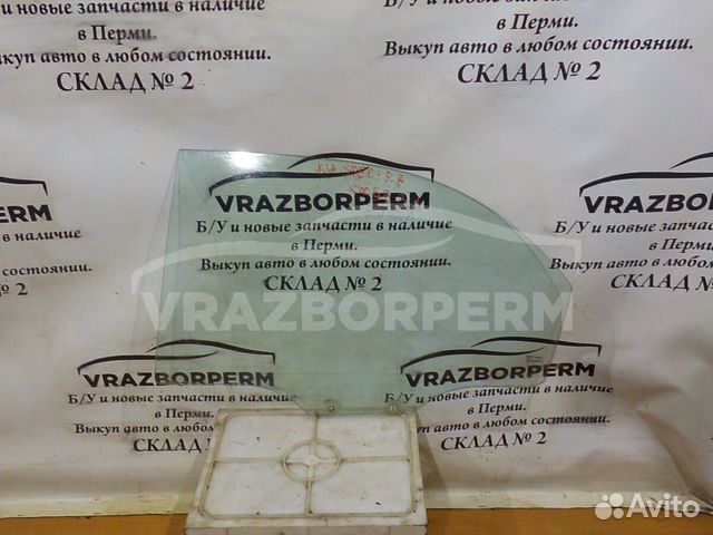 Стекло двери задней левой (опускное) Kia Spectra