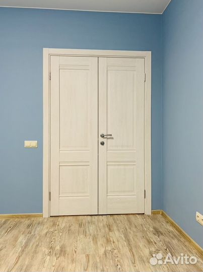 Новые белые межкомнатные двери в классическом стил