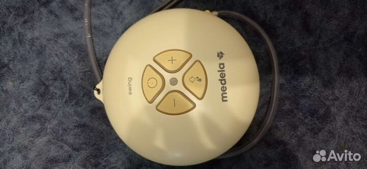 Молокоотсос medela swing электрический