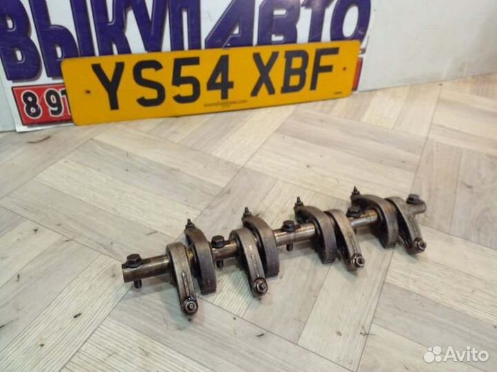 Ось коромысел Renault Logan 2 K7M 1.6Л