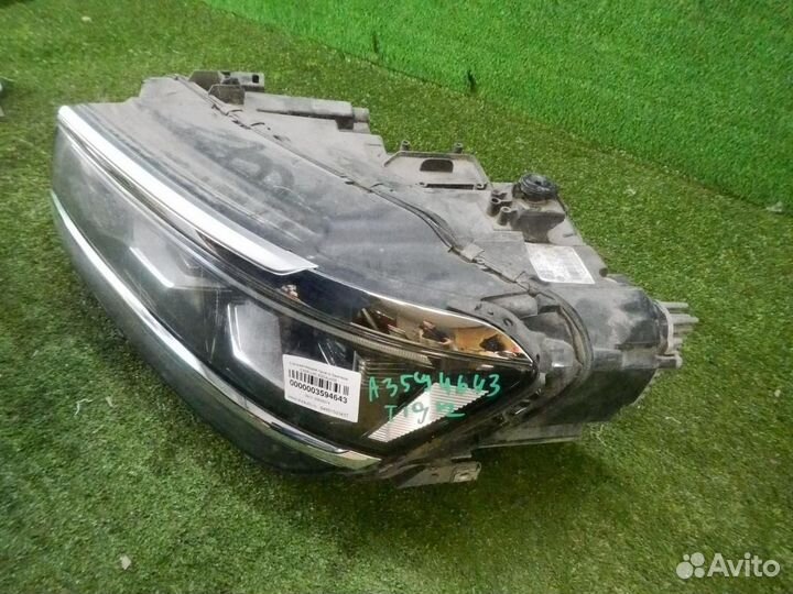 Фара левая Volkswagen Tiguan
