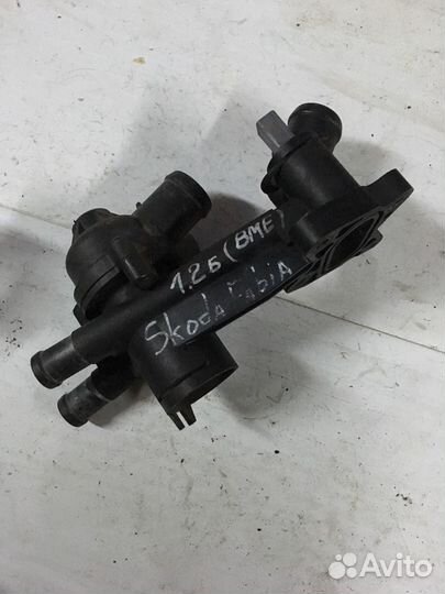 Корпус термостата 03C121111B Skoda 1.2