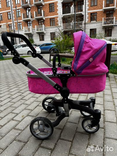 Детская игрушечная коляска