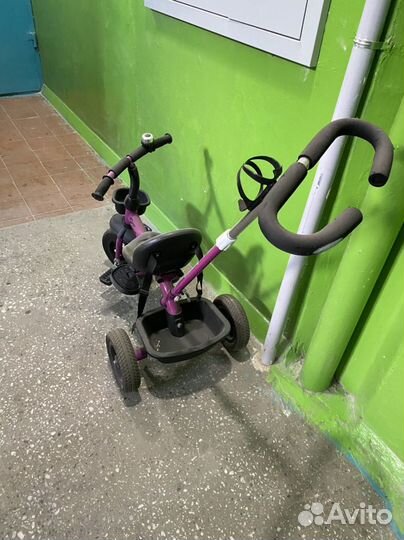 Трехколесный велосипед с ручкой