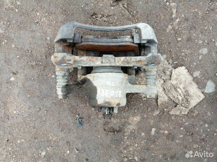 Суппорт передний левый Chevrolet Aveo T250 B12D1