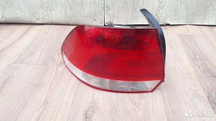 Фонарь левый №99 Volkswagen Polo Sedan 2013