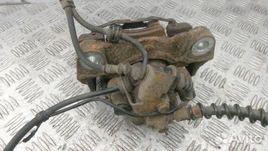 Суппорт тормозной задний левый volkswagen touareg