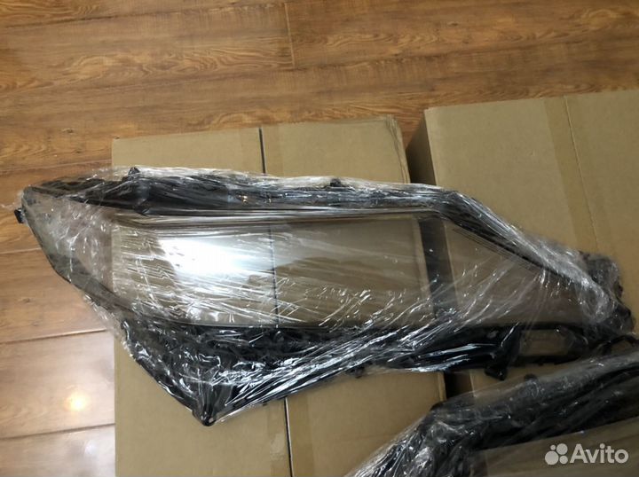 Стекло фары Camry 70