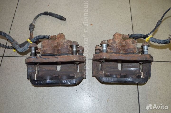 Суппорт тормозной передний Land Rover Discovery 3