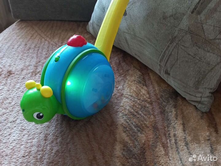 Игровая дуга с игрушками. Каталка музыкальная