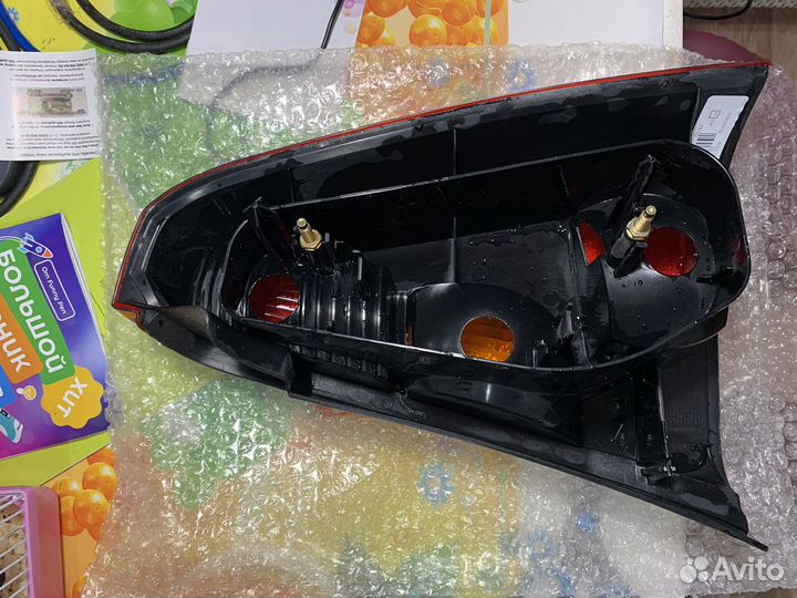 Фонарь задний левый и правый renault logan1