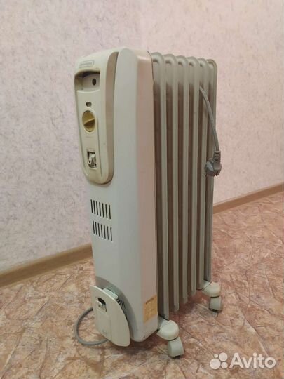 Масляный обогреватель delonghi