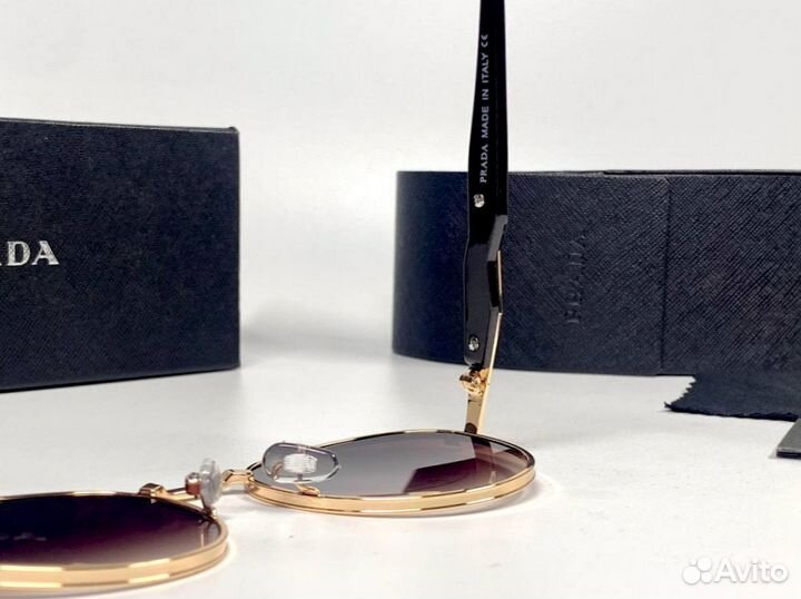 Очки Prada золотые круглые
