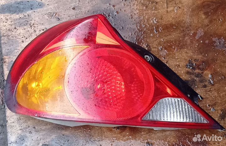 Фонарь задний левый на Kia Spectra