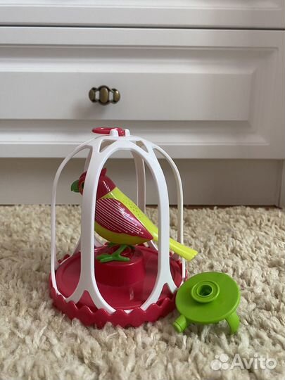 Игрушка говорящая птичка