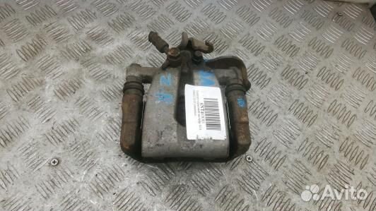 Суппорт тормозной задний правый KIA CEE'D 2 (JD)