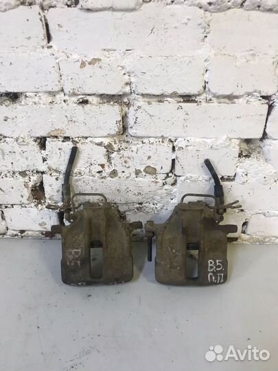 Тормозной суппорт передний VW Passat B5