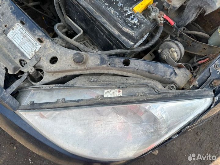 Фара левая Ford Focus 1 cdda 2004
