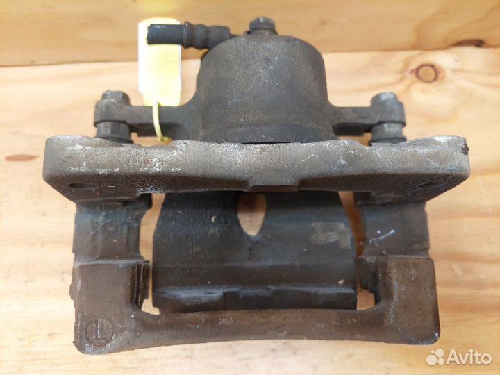 Суппорт передний левый Toyota Vitz KSP90 1krfe