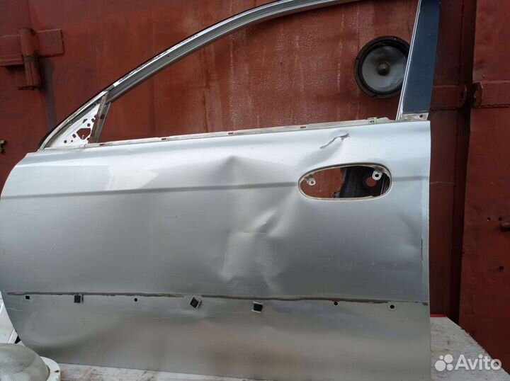 Левая дверь водителя kia spectra помятая