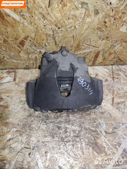 Суппорт тормозной передний правый Opel Astra H